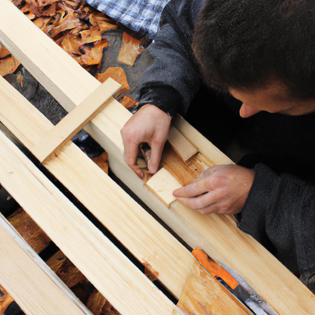 Person using wood building materials